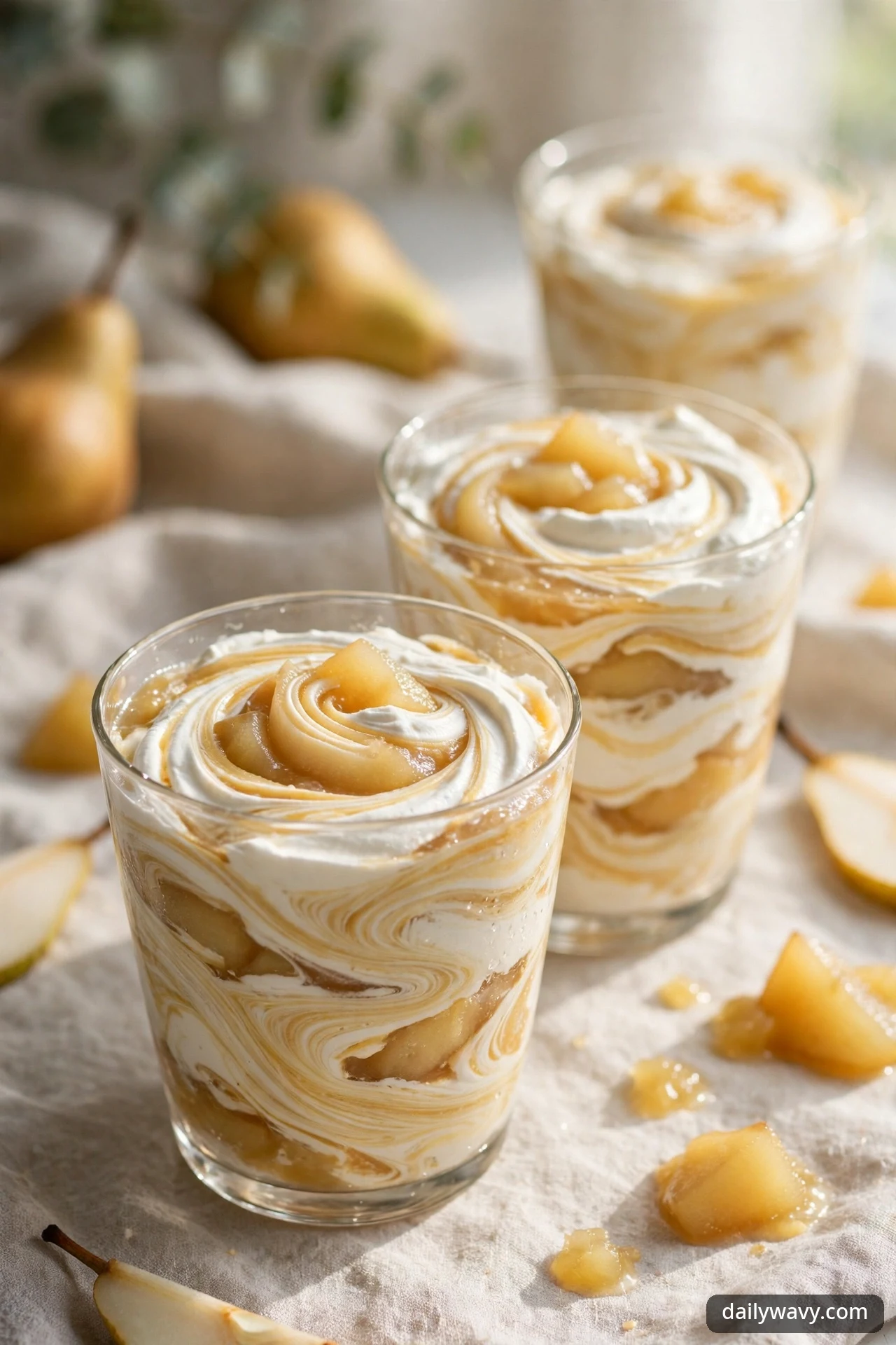 Pear fool with marbled swirls of stewed pear and whipped cream