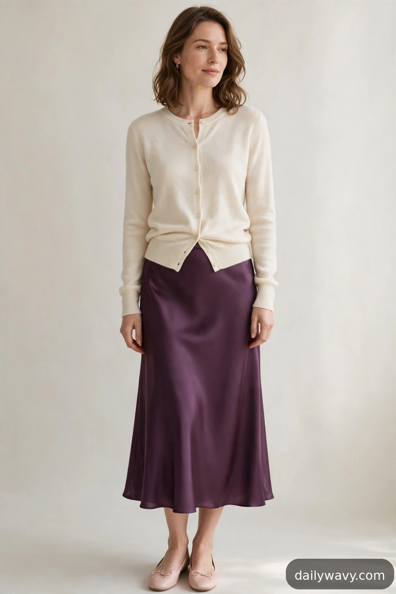Adult wearing buttoned cardigan and ballet flats for satin midi skirt outfits