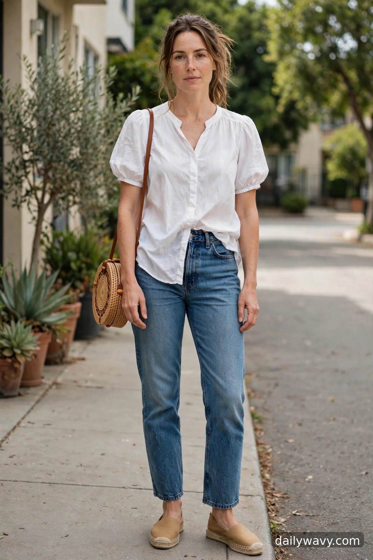 Adult wearing cotton blouse, basket bag and espadrilles for straight‑leg jeans outfits