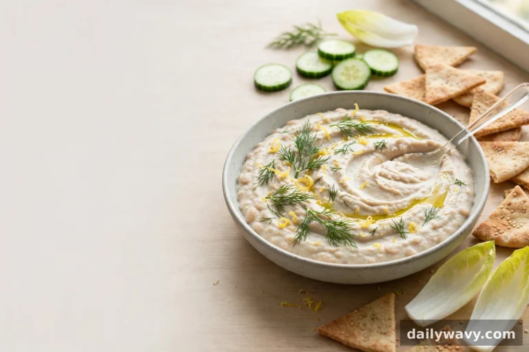 White bean dip shown in a complete styled scene