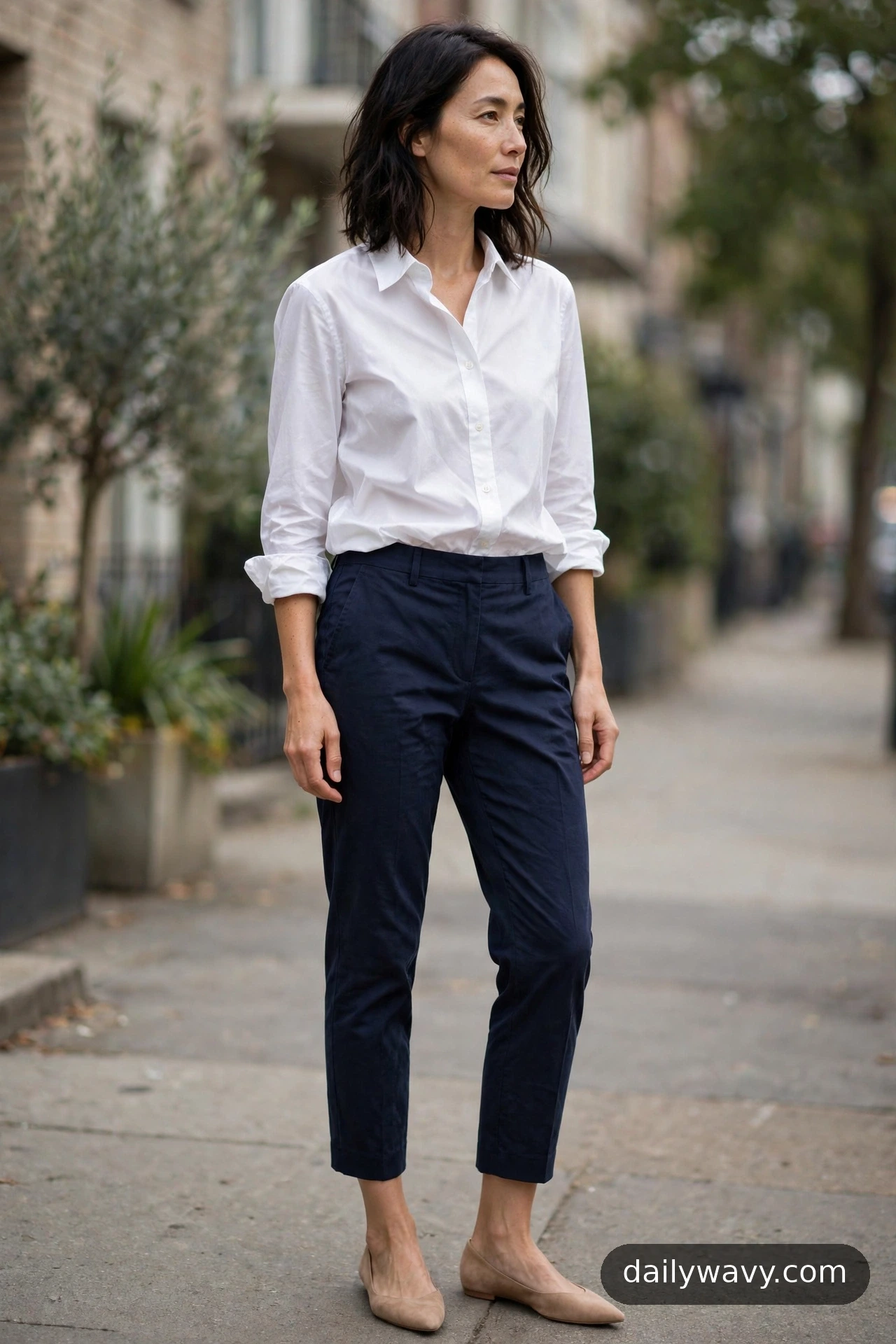 White button-down shirt with cropped trousers and pointed flats