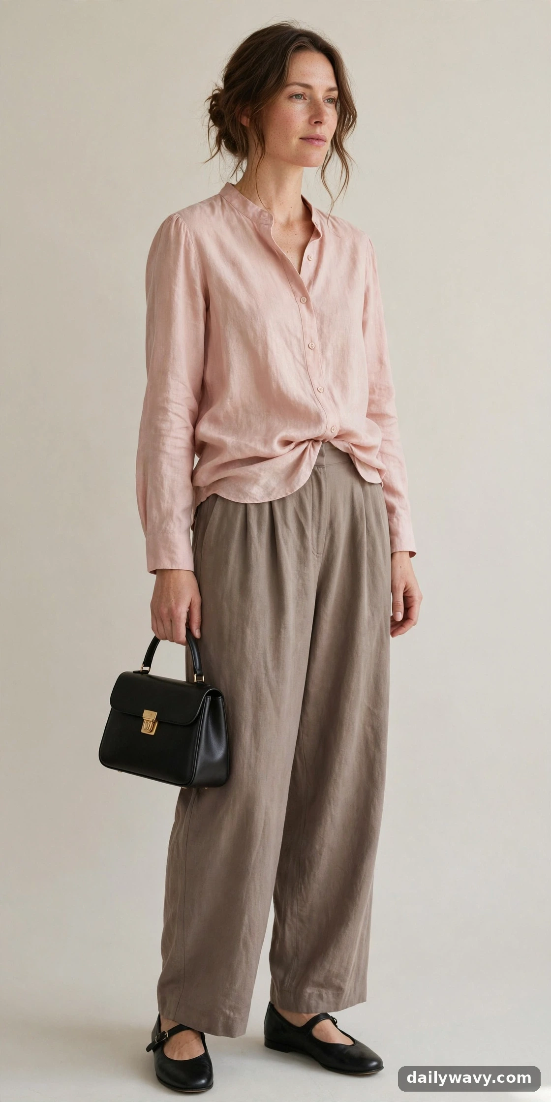 Soft blouse, small bag and Mary Janes styled with wide-leg trousers